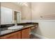 Bathroom with a vanity featuring granite countertops and neutral cabinets at 1072 E Jade Dr, Chandler, AZ 85286