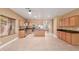 Spacious kitchen featuring stainless steel appliances, tile floors and maple cabinetry at 1072 E Jade Dr, Chandler, AZ 85286