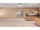 View of kitchen area featuring stainless steel appliances and tile flooring at 1072 E Jade Dr, Chandler, AZ 85286