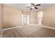 Bedroom with carpet, ceiling fan, and neutral colored walls at 1072 E Jade Dr, Chandler, AZ 85286