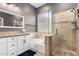 Bathroom featuring granite counters and a glass enclosed shower at 11163 E Laurel Ln, Scottsdale, AZ 85259