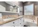 Bathroom featuring granite counters and a soaking tub at 11163 E Laurel Ln, Scottsdale, AZ 85259