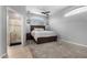 Spacious bedroom with a ceiling fan and carpet flooring at 11163 E Laurel Ln, Scottsdale, AZ 85259
