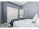 Cozy bedroom featuring carpet flooring and closet space at 11163 E Laurel Ln, Scottsdale, AZ 85259