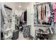 Organized walk-in closet with ample shelving and hanging space for efficient storage and easy access to items at 11571 E Chevelon Trl, Gold Canyon, AZ 85118