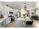 Well-lit kitchen with stainless steel appliances, a large island, and ample counter space for cooking at 11571 E Chevelon Trl, Gold Canyon, AZ 85118