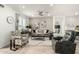 Bright and airy living room features comfortable seating, stylish decor, and plenty of natural light at 11571 E Chevelon Trl, Gold Canyon, AZ 85118