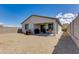 Wide angle view of home and backyard featuring desert landscaping at 11738 S 173Rd Ln, Goodyear, AZ 85338