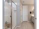Modern bathroom with a glass shower door and sleek fixtures at 11738 S 173Rd Ln, Goodyear, AZ 85338