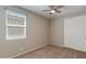 This bedroom has natural light and a large closet at 11738 S 173Rd Ln, Goodyear, AZ 85338