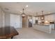 Open-concept kitchen featuring stainless steel appliances and a large island, perfect for entertaining at 11738 S 173Rd Ln, Goodyear, AZ 85338