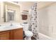 Bathroom features a shower-tub combo, toilet, and single sink vanity at 125 S 56Th St # 100, Mesa, AZ 85206