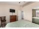 This is a well-lit bedroom with modern decor and large closet at 125 S 56Th St # 100, Mesa, AZ 85206