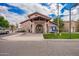 Community clubhouse featuring a well-maintained building, manicured landscaping, and ample parking for resident convenience at 125 S 56Th St # 100, Mesa, AZ 85206