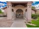Charming clubhouse featuring mailboxes, an arched entryway, and meticulously maintained landscaping, ideal for community interaction at 125 S 56Th St # 100, Mesa, AZ 85206