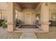 Inviting front porch with seating area for relaxing or entertaining at 125 S 56Th St # 100, Mesa, AZ 85206