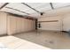 Spacious garage with ample storage cabinets and epoxy flooring at 125 S 56Th St # 100, Mesa, AZ 85206