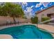 Inviting hot tub featuring clear blue water, mosaic tile detail and surrounding chairs for a relaxing outdoor experience at 125 S 56Th St # 100, Mesa, AZ 85206