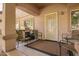 Cozy covered patio with outdoor furniture and a grill, perfect for relaxing and entertaining at 125 S 56Th St # 100, Mesa, AZ 85206