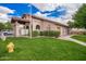 Well-maintained recreation center featuring lush green lawns, manicured shrubs, and a welcoming path for community enjoyment at 125 S 56Th St # 100, Mesa, AZ 85206