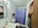 Clean bathroom with a shower/tub combination, toilet, and vanity sink at 141 N Date -- # 7, Mesa, AZ 85201