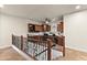 Upstairs office space with built-in shelves and a ceiling fan provides a functional and stylish workspace at 1515 E Saratoga Ct, Gilbert, AZ 85296
