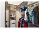 Organized walk-in closet with ample shelving and hanging space for clothes and accessories at 1515 E Saratoga Ct, Gilbert, AZ 85296