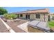 View of backyard featuring desert landscaping and hot tub at 1617 E Fremont Rd, Phoenix, AZ 85042