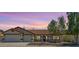 Charming single-story home features a well-maintained front yard, neutral paint, and a two-car garage at 1617 E Fremont Rd, Phoenix, AZ 85042