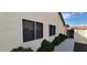 Exterior shot of the home with newer windows and well-maintained landscaping at 1617 E Fremont Rd, Phoenix, AZ 85042