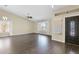 Bright and airy living room with high ceilings and modern wood-look flooring at 1617 E Fremont Rd, Phoenix, AZ 85042