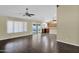 Open concept living space with hardwood floors and sliding door to patio, perfect for entertaining at 1617 E Fremont Rd, Phoenix, AZ 85042