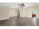 Expansive living area with modern flooring, recessed lighting, and an open layout at 1617 E Fremont Rd, Phoenix, AZ 85042