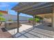 Shaded patio with hot tub and desert landscaping at 1617 E Fremont Rd, Phoenix, AZ 85042