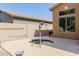 Cozy backyard featuring a hot tub, and low maintenance desert landscaping at 16228 W Crocus Dr, Surprise, AZ 85379