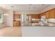Kitchen with stainless steel appliances, ample cabinet space, and an open layout to the dining area at 16228 W Crocus Dr, Surprise, AZ 85379