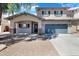 Charming two-story home with a spacious two-car garage and manicured front yard in a desirable neighborhood at 17812 N Carmen Ave, Maricopa, AZ 85139