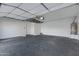 Spacious garage with ample storage and an included water heater at 17812 N Carmen Ave, Maricopa, AZ 85139