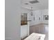 Bright kitchen featuring stainless steel appliances, granite counters, and an open view to the living area at 17812 N Carmen Ave, Maricopa, AZ 85139