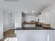 Open-concept kitchen with stainless steel appliances, granite countertops, and ample counter space for cooking at 17812 N Carmen Ave, Maricopa, AZ 85139