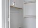 Walk-in closet with ample storage space, shelving, and custom organizers at 17812 N Carmen Ave, Maricopa, AZ 85139