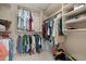 Well-organized walk-in closet with shelving and hanging space for optimal storage at 18163 W Addie Ln, Surprise, AZ 85374