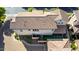 A high-angle captures the building's roof, showcasing its unique design and surrounding greenery at 1930 W Yellowstone Way, Chandler, AZ 85248