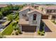 Aerial view of a two-story house with a tile roof and well-manicured landscaping at 1930 W Yellowstone Way, Chandler, AZ 85248