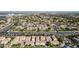 Sprawling aerial shot captures neighborhood layout near bustling roads, green spaces, and community living at 1930 W Yellowstone Way, Chandler, AZ 85248