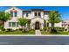 Charming two-story home featuring a tiled roof, arched entry, and landscaped front yard in a desirable neighborhood at 1930 W Yellowstone Way, Chandler, AZ 85248