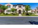 Charming two-story home featuring a tiled roof, arched entry, and landscaped front yard in a desirable neighborhood at 1930 W Yellowstone Way, Chandler, AZ 85248