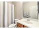 Standard bathroom with shower, toilet, and vanity with sink, mirror, and towel rack at 2146 S Drexel --, Mesa, AZ 85209