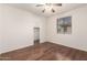 Bright bedroom boasting wood floors, window with blinds, and walk-in closet at 2146 S Drexel --, Mesa, AZ 85209