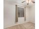Cozy bedroom featuring neutral carpet, ceiling fan, and window with blinds and curtains at 2146 S Drexel --, Mesa, AZ 85209